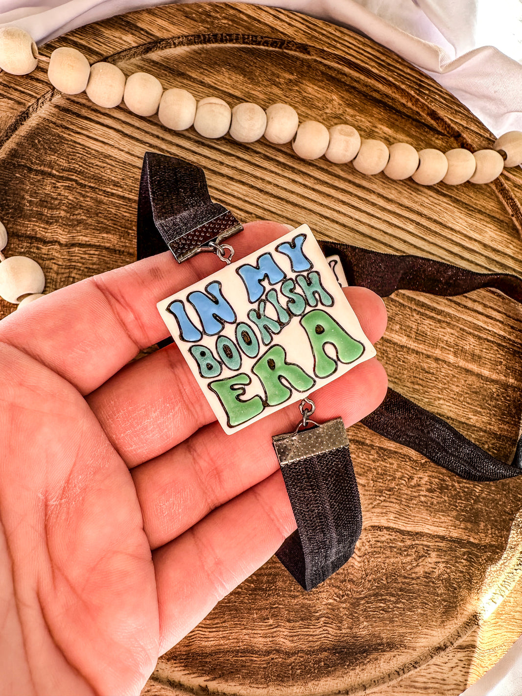 Bookish Era Hand-Painted Clay Bookmark | Adjustable Elastic Page Holder