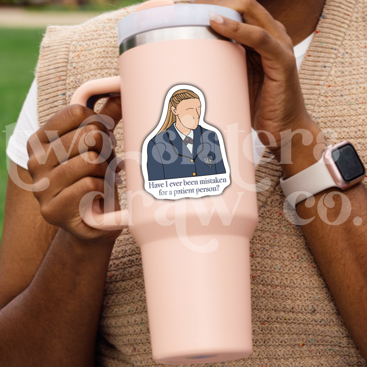 Person holding a tumbler with an hand-drawn sticker of Paris Geller wearing Chilton uniform with the text 'Have I ever been mistaken for a patient person?’