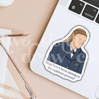 Hand-drawn sticker of Paris Geller wearing Chilton uniform with the text 'Have I ever been mistaken for a patient person?' on a laptop.