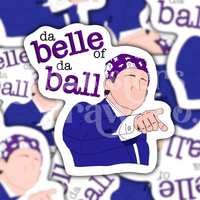 Hand-drawn sticker of Michael Scott pointing and wearing a purple bandana with the text 'da belle of da ball' on a patterned background.